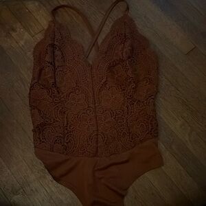 Orange lace bodysuit tank with criss-cross back